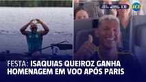 Isaquias Queiroz é recebido com festa durante voo