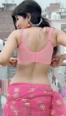 Rumantic Indian girl looking sexy in pink dress