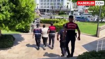 Marmaris'te dolandırıcı erkek kılığında yakalandı