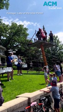 Crowds turn out for annual sharpening of 20-foot-tall pencil