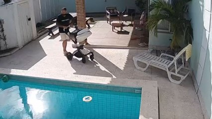 Dad tumbles over a baby stroller and retrieves it from mishap instantly