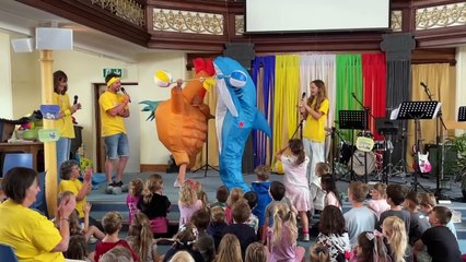 Chicken and shark doing weightlifting (Will Goddard, Crediton Courier)