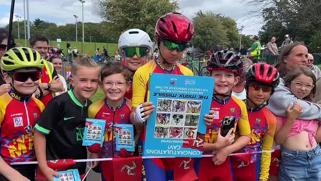 Young fans of Sir Mark Cavendish queue for autographs in Douglas