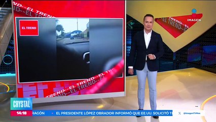 VIDEO: Conductor se lleva a policía en el cofre