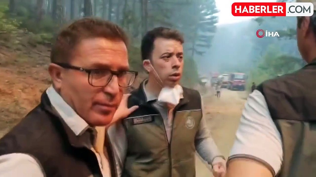 Ula'daki orman yangınında vatandaşlar su damacanaları ile destek veriyor