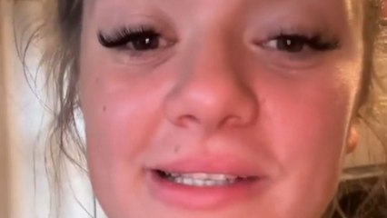 Parents join kids in the bouncy castle for a day of family fun