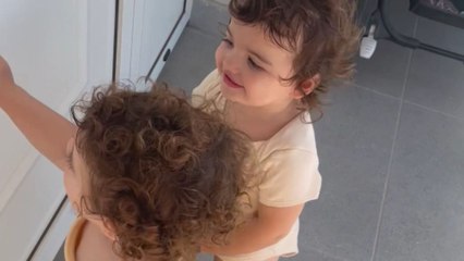 Twins' first meeting with baby brother goes exactly as per parents' expectations