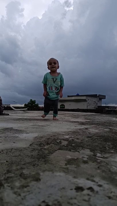Cute baby in masty #cloud sky #viral #trending #reels #short #foryou #baby movement #naturally