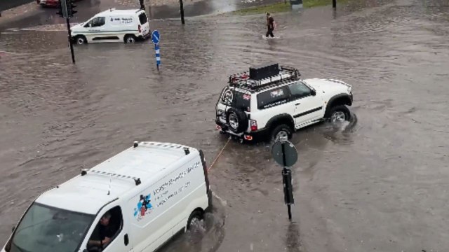Abrupt summer rain in Tartu, Estonia has caused heavy flooding, creating challenges for both drivers and pedestrians.