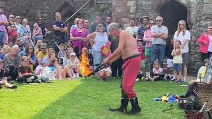 Castle jester Rob Sim shows off his juggling skills at Goodrich Castle