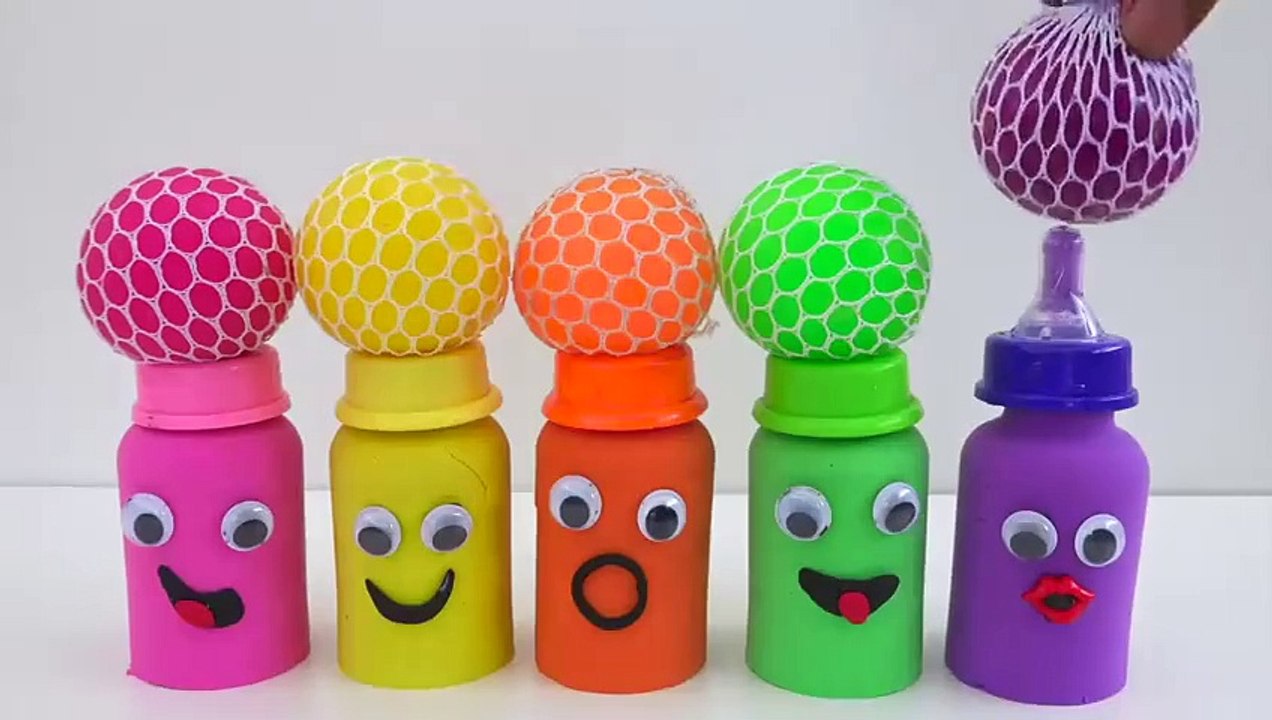 Match Rainbow Colors Squishy  Balls with Kinetic Sand  Milk Bottles Smiley Face -  video for kids