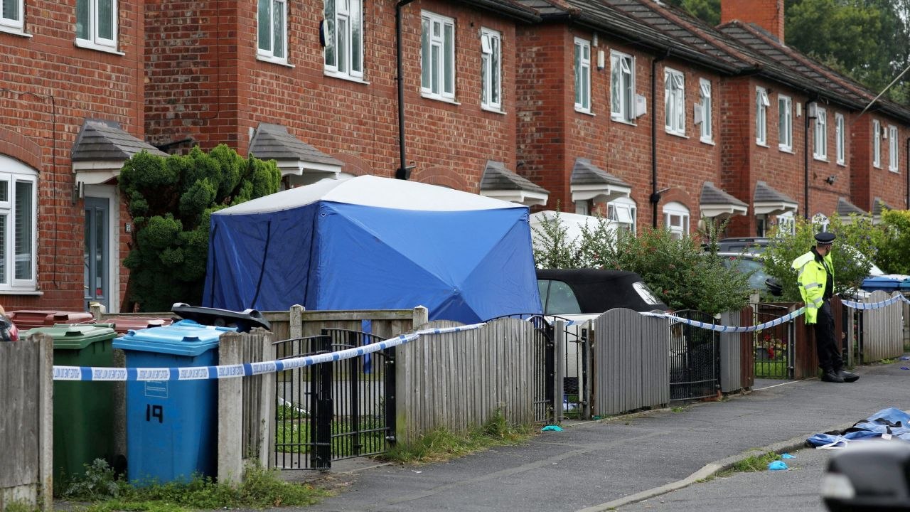 Mum 'stabbed to death by son' in knife horror that left two fighting for life
