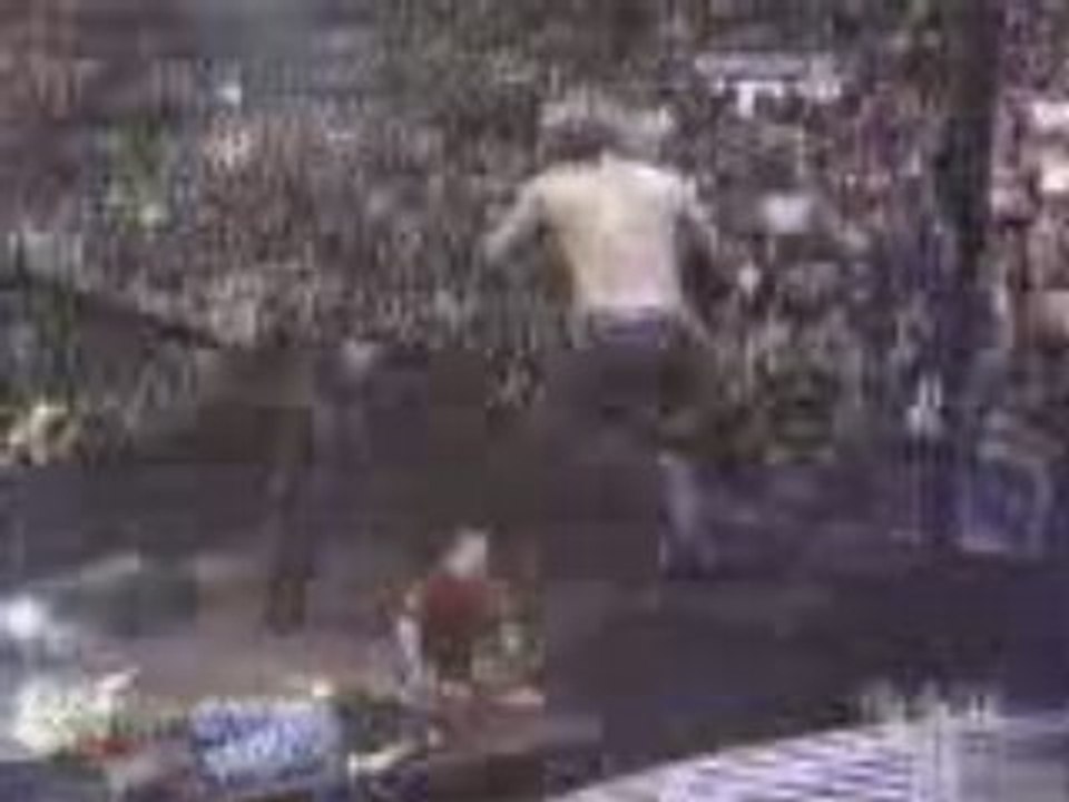 WWE - Jeff Hardy legdrops both Dudleys through tables