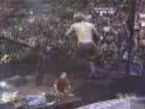 WWE - Jeff Hardy legdrops both Dudleys through tables