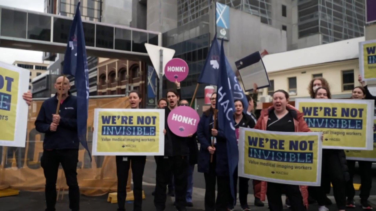Royal Hobart Hospital allied health workers join industrial action, adding pressure on state government amid looming $16 billion debt warning