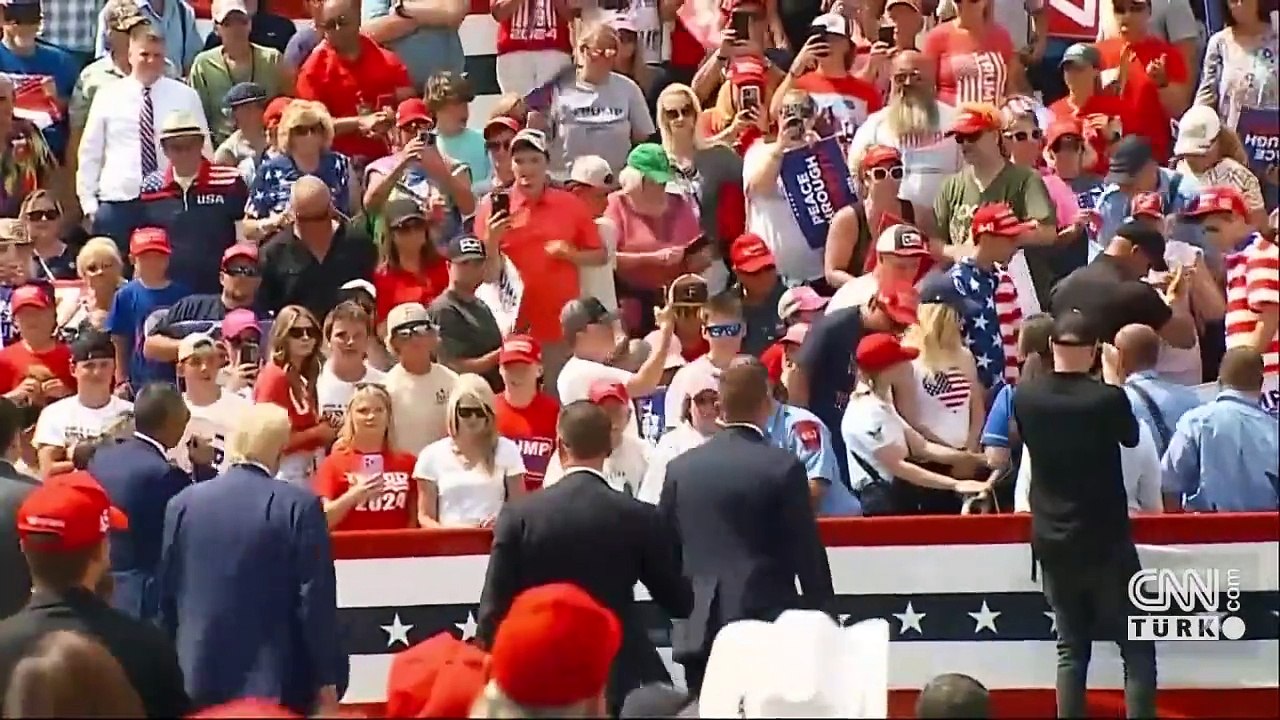 VİDEO | Trump'tan saldırı sonrası ilk miting: Kurşun geçirmez camın arkasından konuştu!