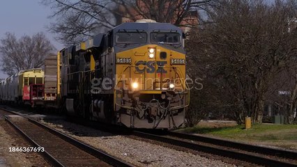gettyimages-1846367693-640_adppFreight Train approaching crossing - 4K stock video