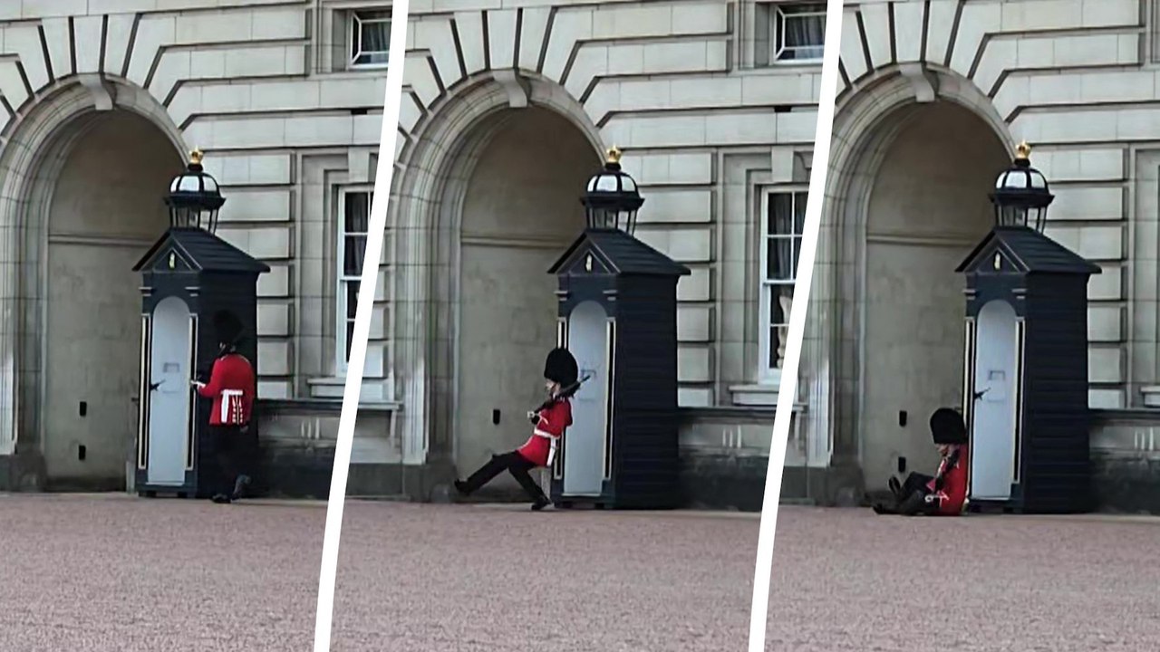 Wachmann des buckingham palace rutscht aus und landet während seines dienstes auf seinem hintern