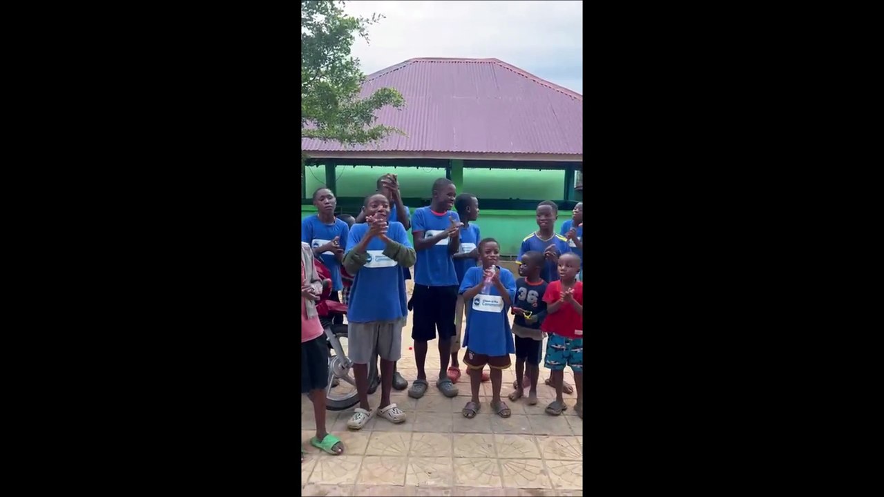 See the reaction of children in Liberia after Worthing youth football coach Ian Fenwick delivered Brighton & Hove Albion kit
