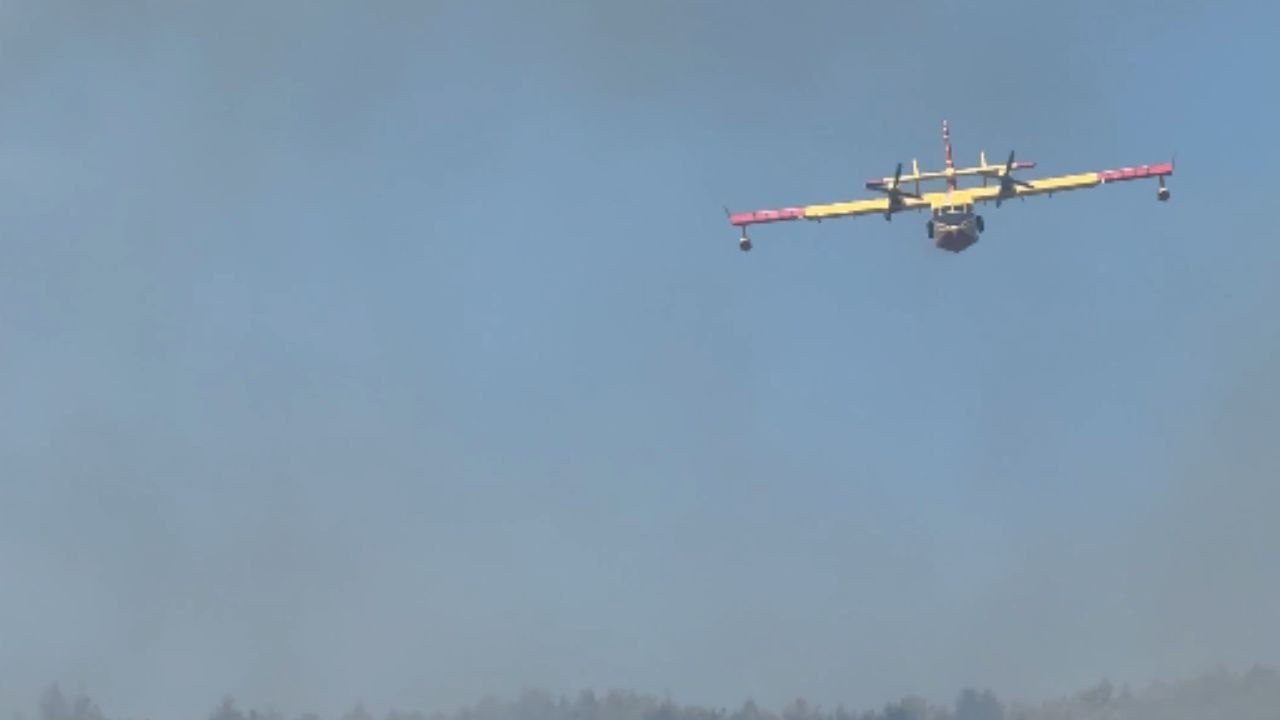 Aerial firefighter enters the scene to combat forest fire in Šibenik, Croatia
