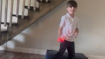 Little boy accidentally hits mom’s camera while playing with his new hover ball