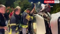 Yan yatan otomobilden cam kesilerek kurtarıldı