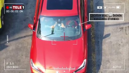 Kucağında çocukla araç kullanan sürücüyü dron yakaladı