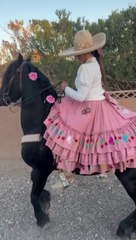 Karely Lara dancing her horse