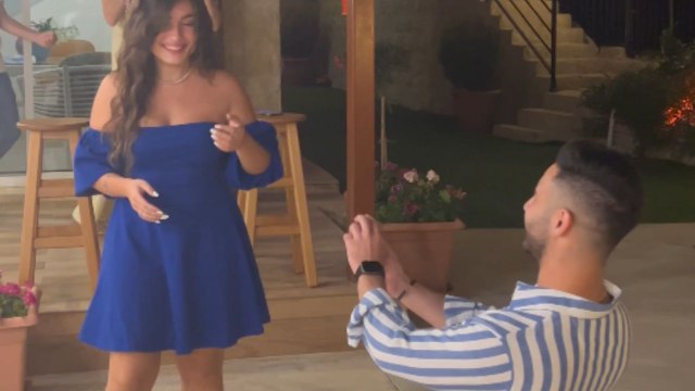 Woman at a loss for words upon being surprised with romantic wedding proposal