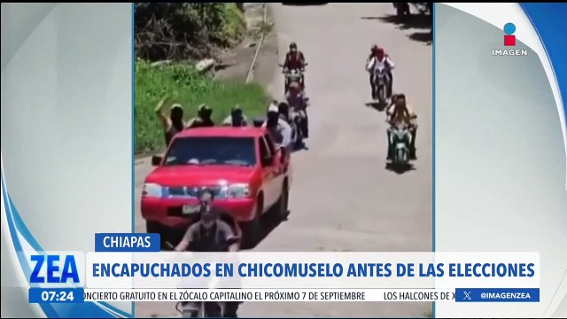 Encapuchados desfilan en Chicomuselo, Chiapas, antes de las elecciones