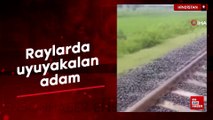 Hindistan'da raylarda uyuyakalan adam ölümden döndü