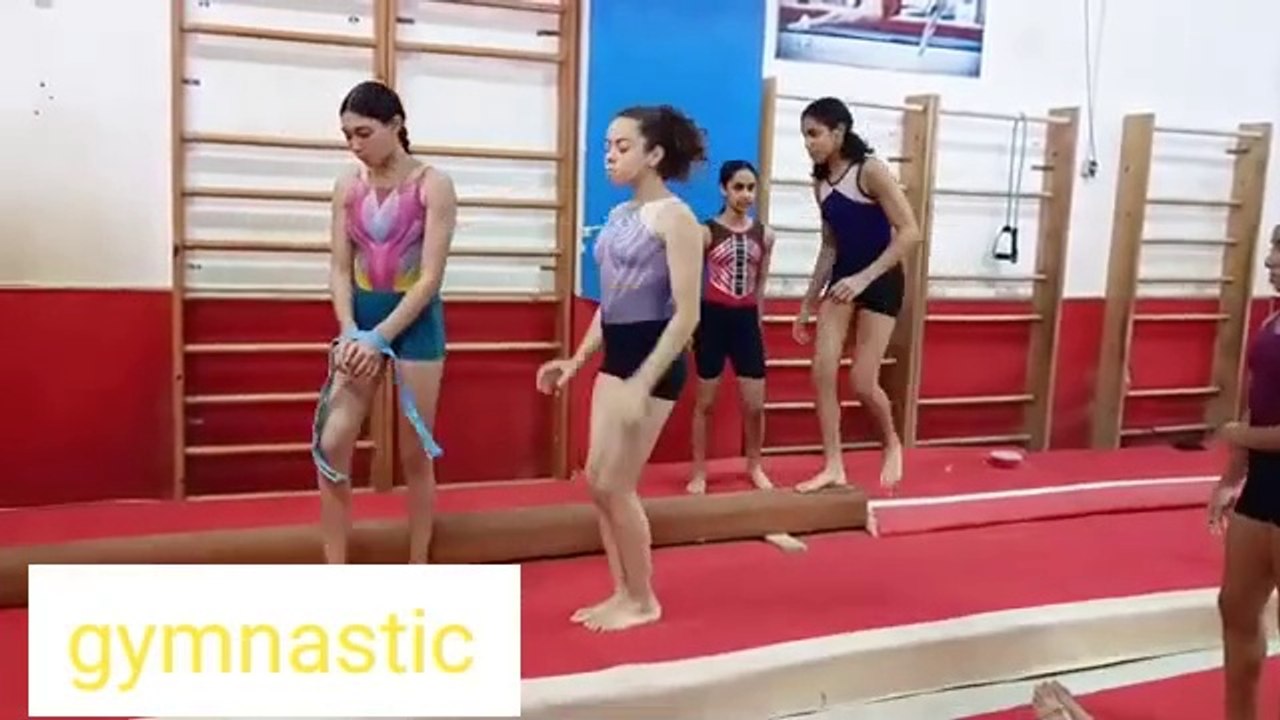 Gymnastics exercise on the balance beam