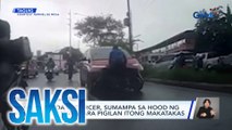 MMDA enforcer, sumampa sa hood ng sasakyan para pigilan itong makatakas | Saksi