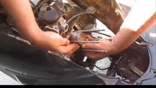 Installing rings on a scooter piston without removing it from the crankshaft.