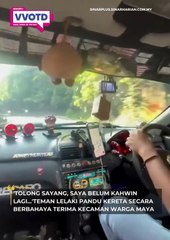 seorang wanita berada dalam ketakutan apabila teman lelakinya memandu kereta dalam keadaan bahaya di kawasan selekoh