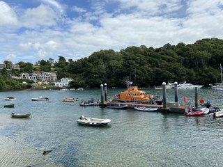 Fowey Lifeboat moored on the river