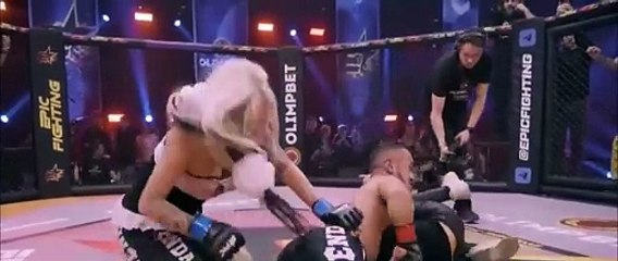 A very short boxer boxing women