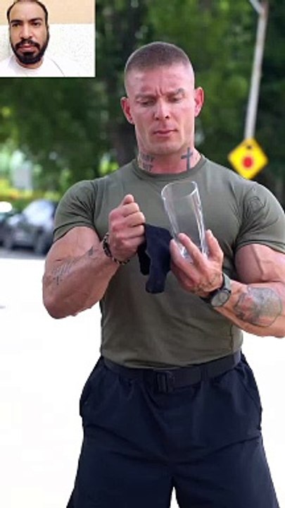 Strong man smashing the cup.رجل قوي يحطم الكأس.