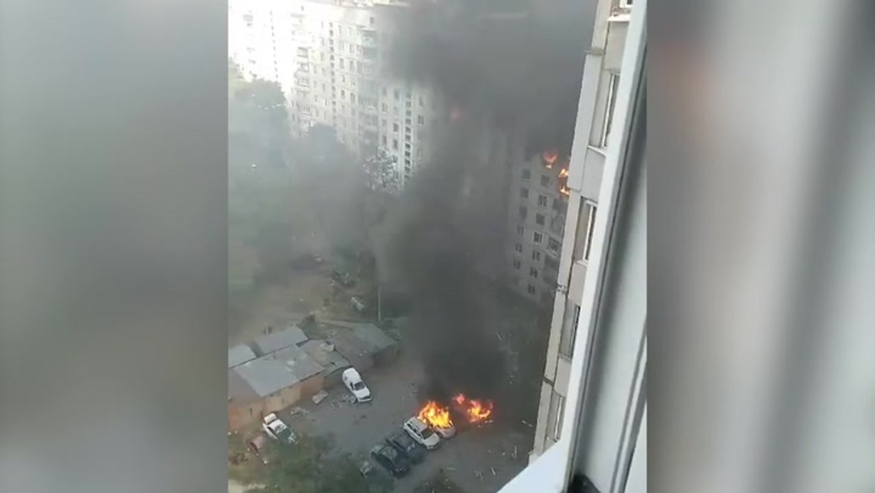 Ukrainian residential building burns after Russian attack on Kharkiv that killed seven