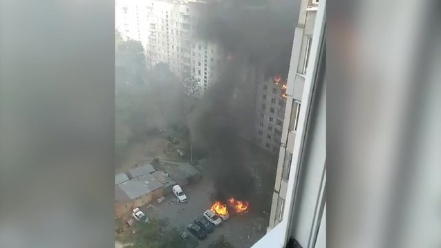 Ukrainian residential building burns after Russian attack on Kharkiv that killed seven