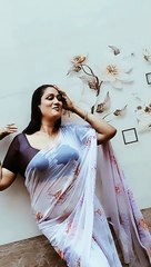 Beautiful Indian aunty in wet saree Dancing