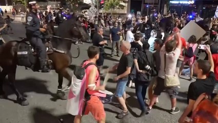 Scuffles break out in Tel Aviv between police and anti-government protesters