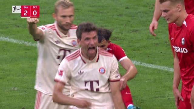 Thomas Muller scores his 150th Bundesliga goal in record appearance