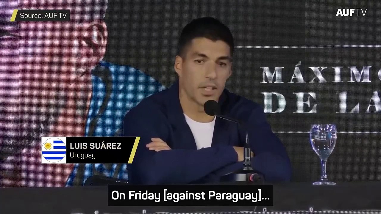 Teary-eyed Suarez announces international retirement