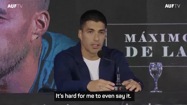 Teary-eyed Suarez announces international retirement