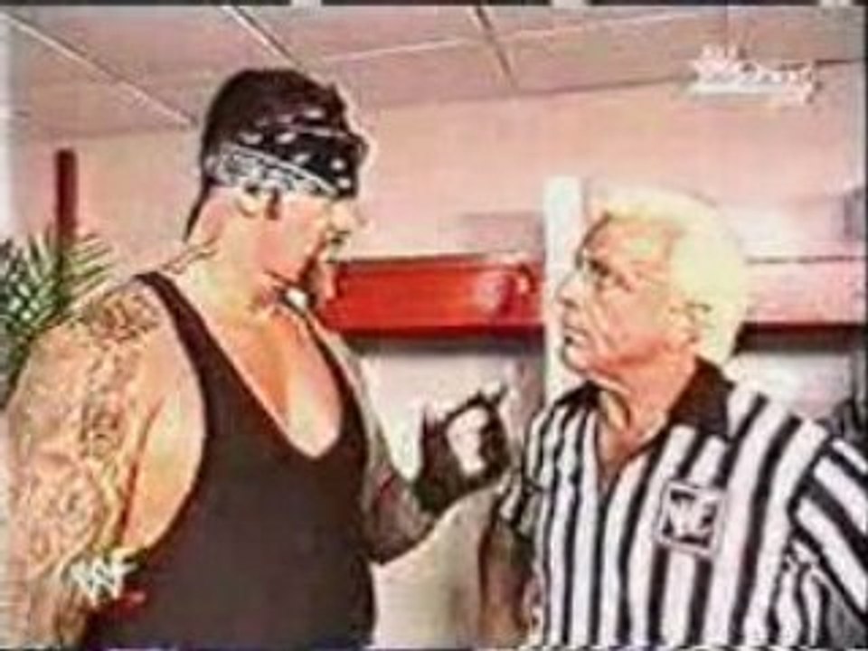 The Undertaker intimidates Ric Flair