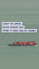 Packed migrant boat caught on video trying to cross English Channel