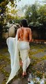 Sexy Indian women in backless wet saree....