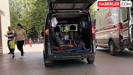 Spiralle ağaç keserken kendini yaraladı