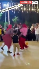 Damadın arkadaşları kadın kılığına girerek vinçle düğüne indi